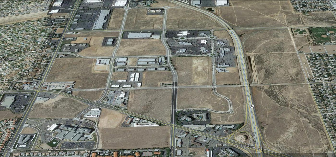 NEC of Trade Center & Auto Center Dr photo 1