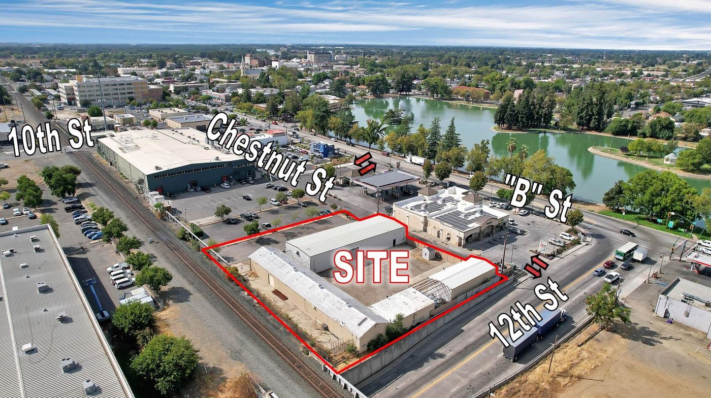 ±11,500 SF Of Clear Span Industrial Buildings + Fenced Lot photo 2