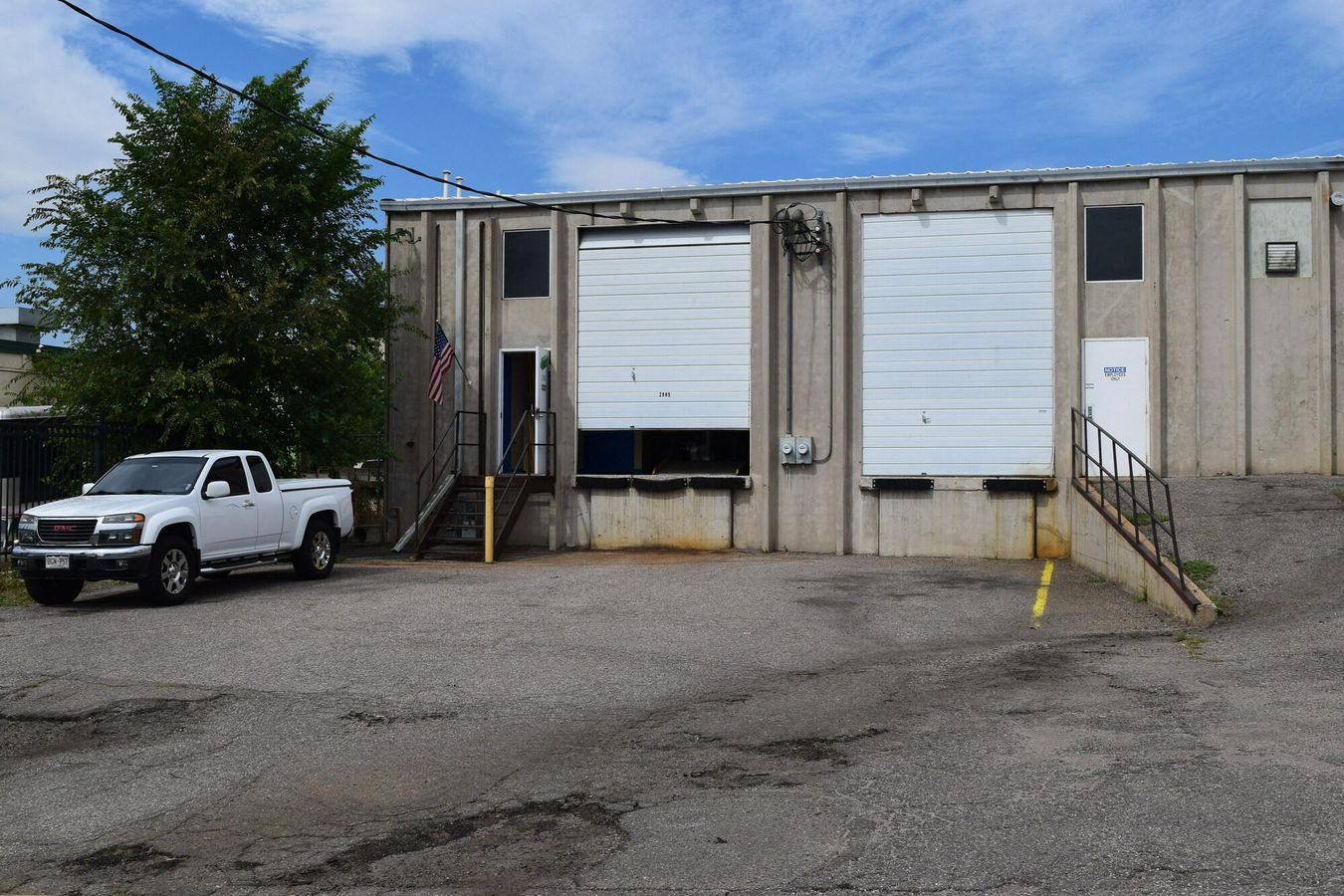 2,000 SF warehouse with dock high loading (drive in access potential) photo 2
