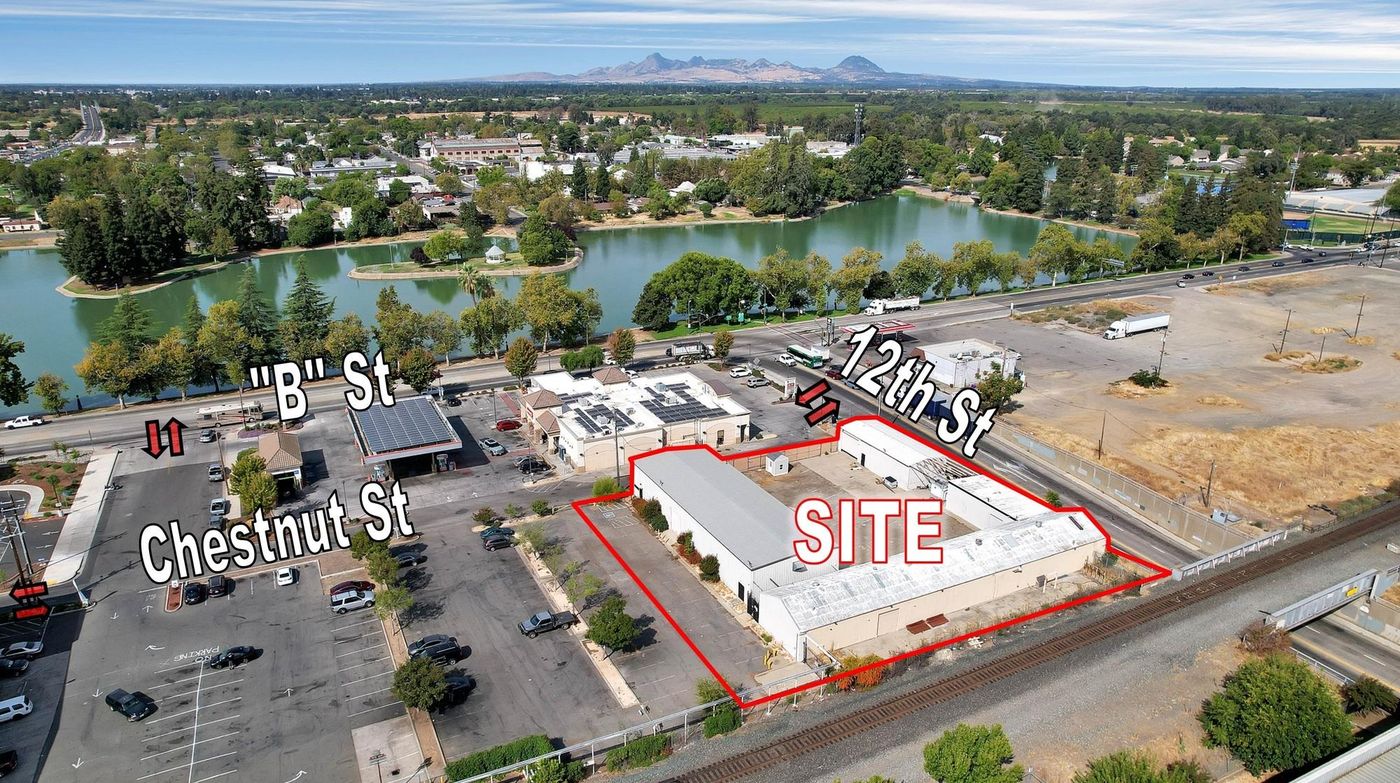 ±11,500 SF Of Clear Span Industrial Buildings + Fenced Lot photo 3