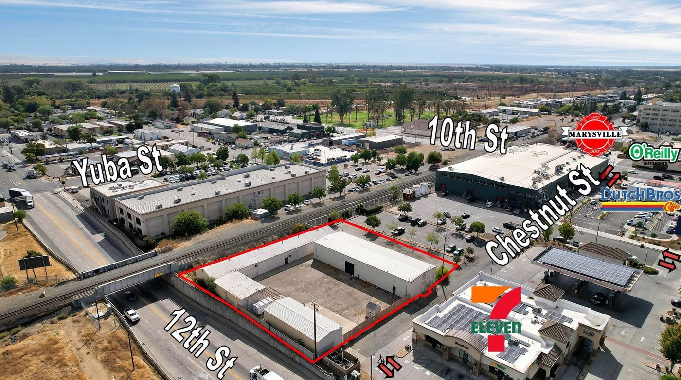 ±11,500 SF Of Clear Span Industrial Buildings + Fenced Lot photo 1