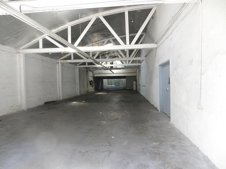 Bow Truss Brick Building With Great Potential photo 2