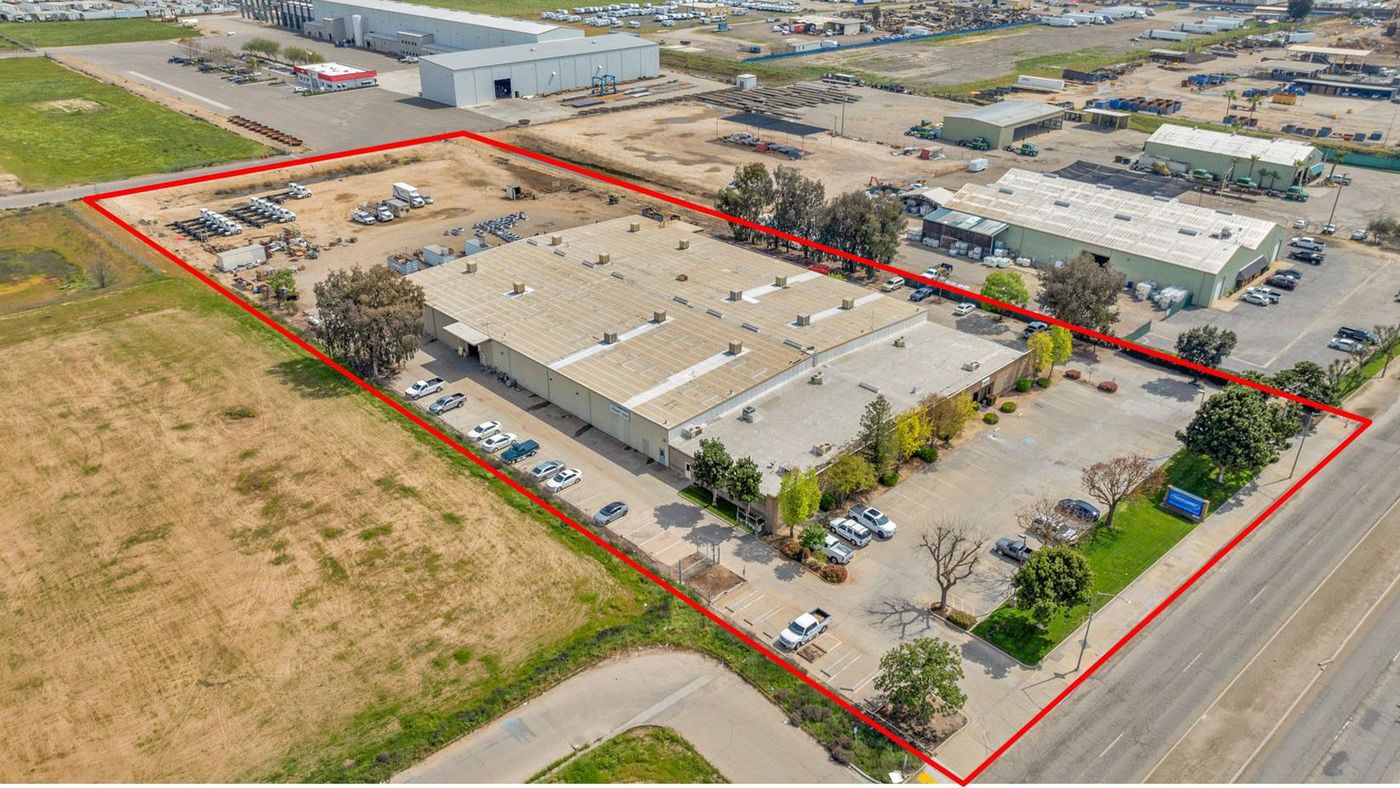 Freestanding Heavy Industrial Building w/ Office/Showroom on ±5 AC photo 1