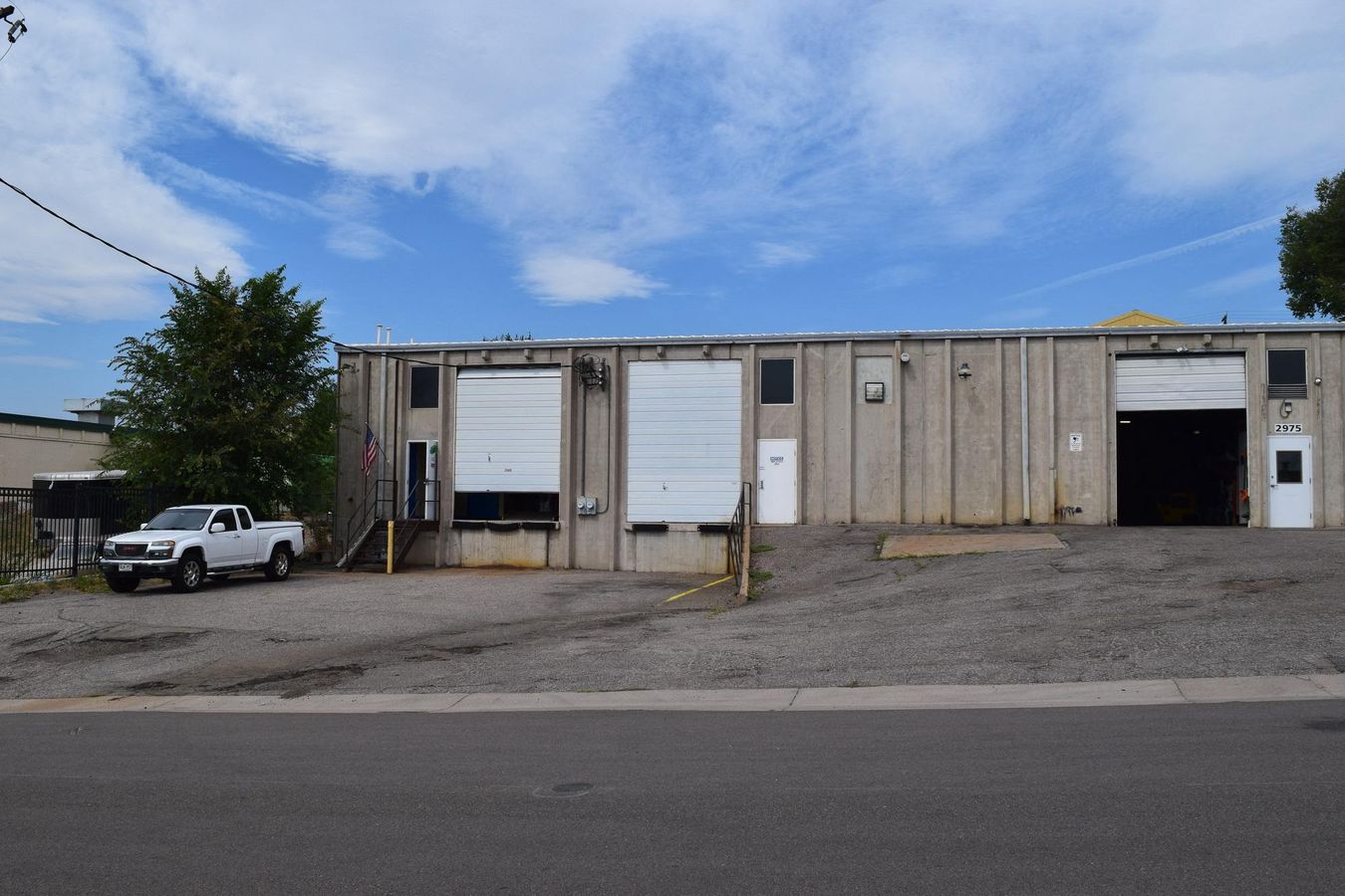 2,000 SF warehouse with dock high loading (drive in access potential) photo 1