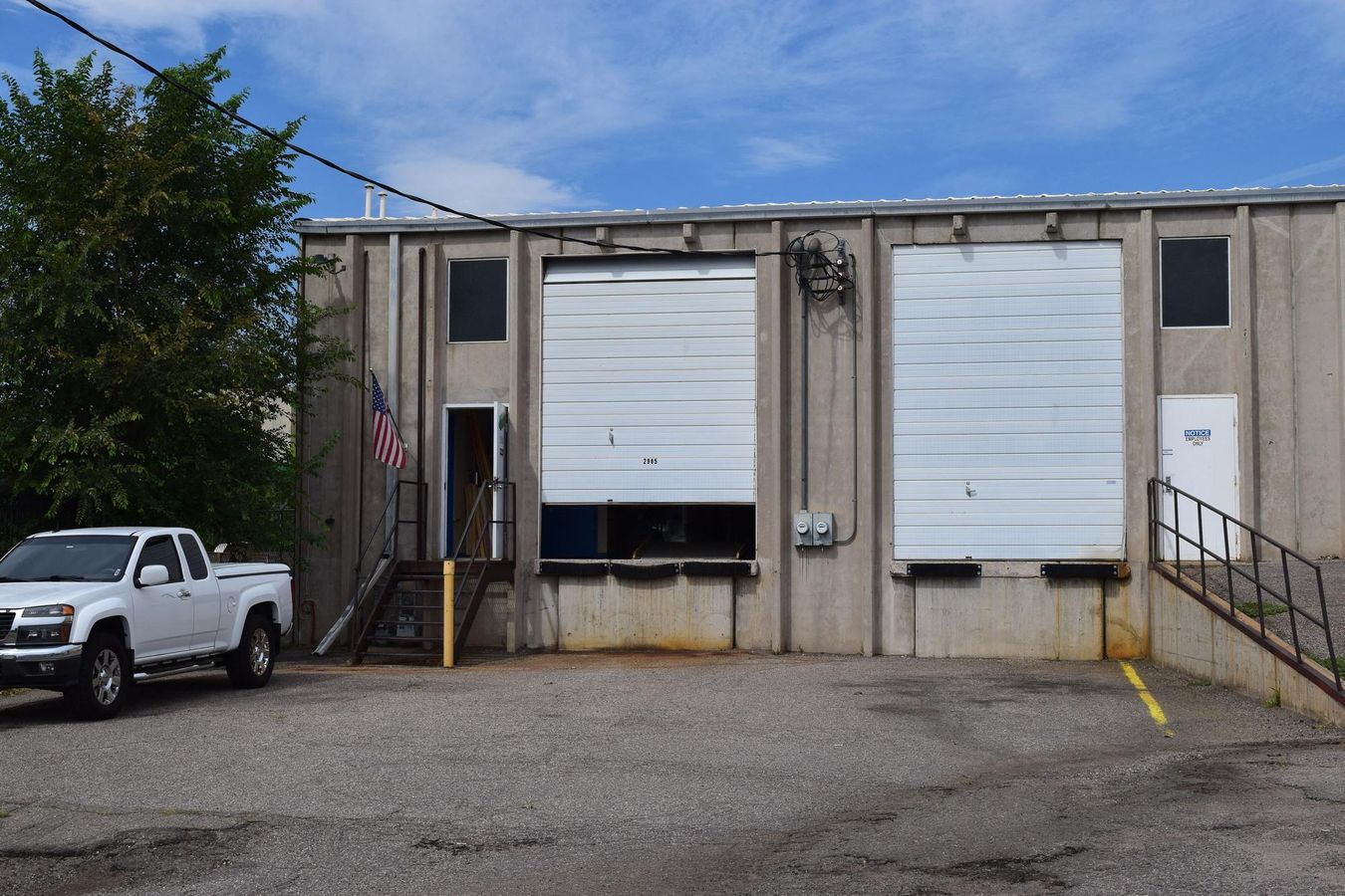 2,000 SF warehouse with dock high loading (drive in access potential) photo 3